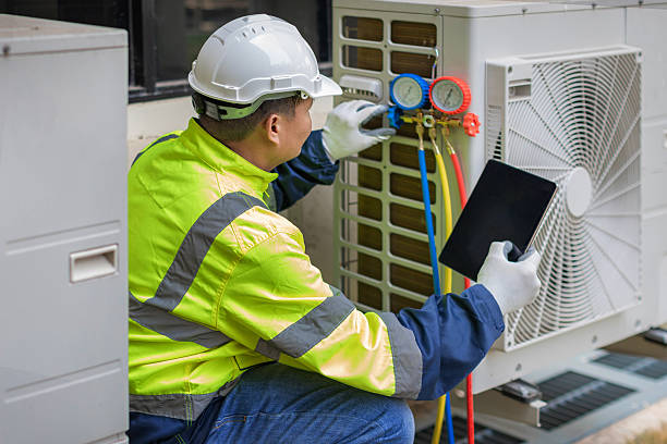 Professional Hvac technician working in North Chelmsford, MA